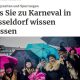 Screenshot eines Artikels über feierende Jecken mit diversen Regenschirmen in Düsseldorf